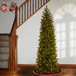 National Tree Company Pre-Lit 'Feel Real' Artificial Slim Downswept Christmas Tree, Green, Douglas Fir, White Lights, Includes Stand, 6.5 feet