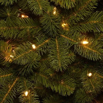 National Tree Company Pre-Lit 'Feel Real' Artificial Slim Downswept Christmas Tree, Green, Douglas Fir, White Lights, Includes Stand, 6.5 feet 2 National Tree Company Pre-Lit 'Feel Real' Artificial Slim Downswept Christmas Tree, Green, Douglas Fir, White Lights, Includes Stand, 6.5 feet - Image 2