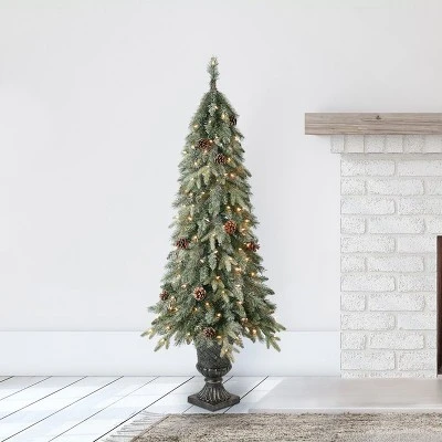 Home Heritage Entryway Potted Pine PVC Pre-Lit Artificial Christmas Tree with Warm White LED Lights and Potted Base 1 Home Heritage Entryway Potted Pine PVC Pre-Lit Artificial Christmas Tree with Warm White LED Lights and Potted Base