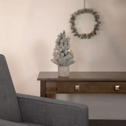 Northlight 16" LED Lighted Mini Frosted Pine Christmas Tree in Cement Base