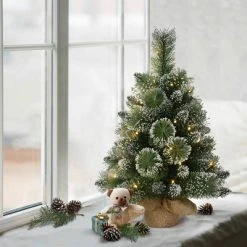2ft Puleo Pre-Lit Flocked Tabletop Artificial Christmas Tree Clear Lights