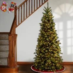 National Tree Company Pre-Lit Artificial Slim Christmas Tree, Green, Tiffany Fir, White Lights, Includes Stand, 7.5 Feet