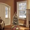 4.5ft Pre-Lit Flocked Bradford Fir Tree Artificial Christmas Tree - Puleo